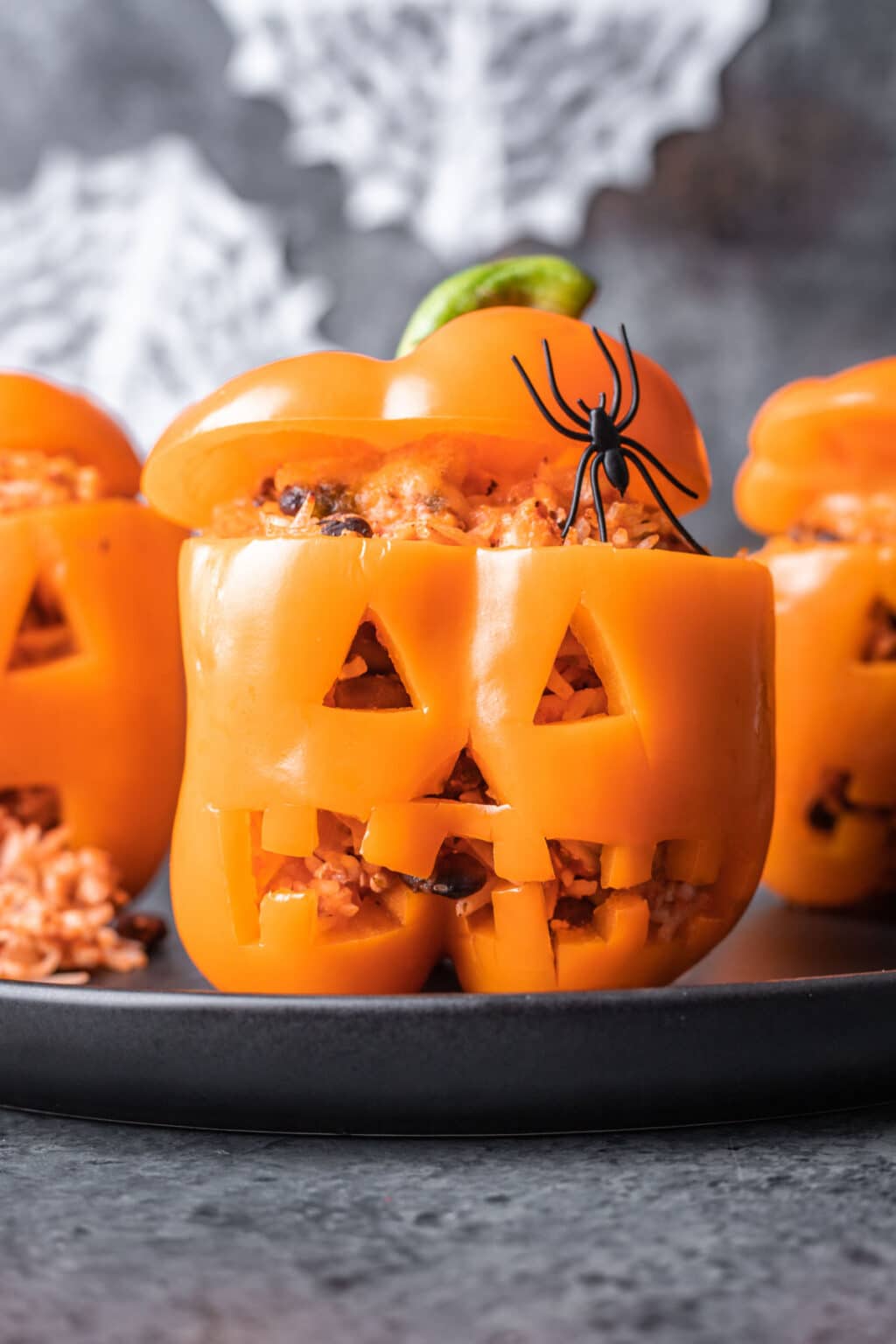 Jack-O'-Lantern Stuffed Peppers - I Heart Eating