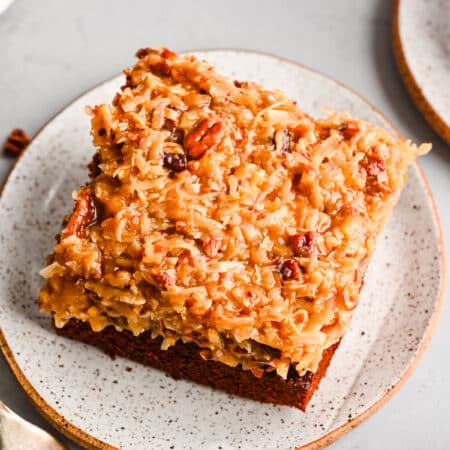 A slice of German chocolate sheet cake on a plate.