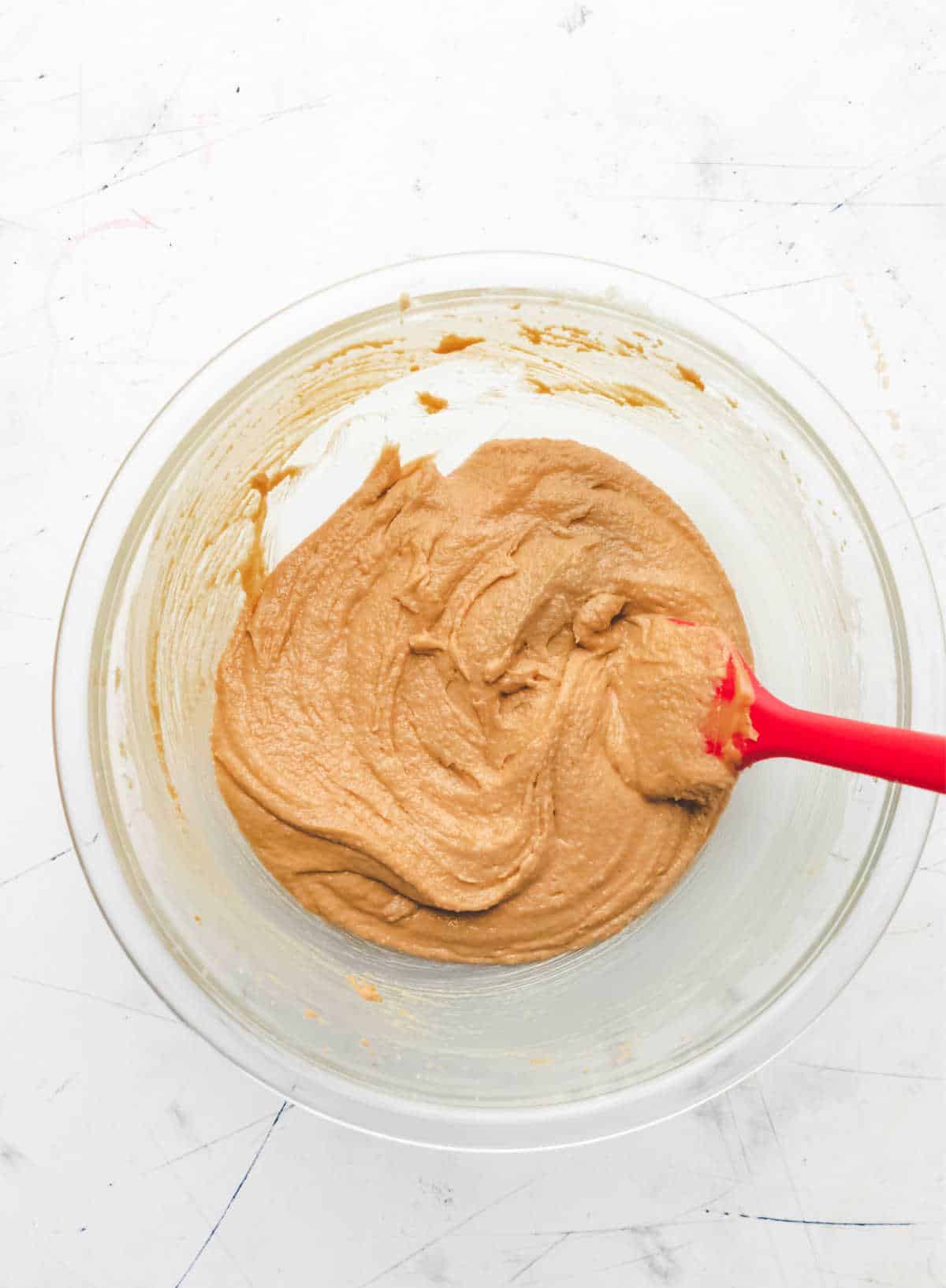 Peanut butter mixed into creamed butter mixture. 