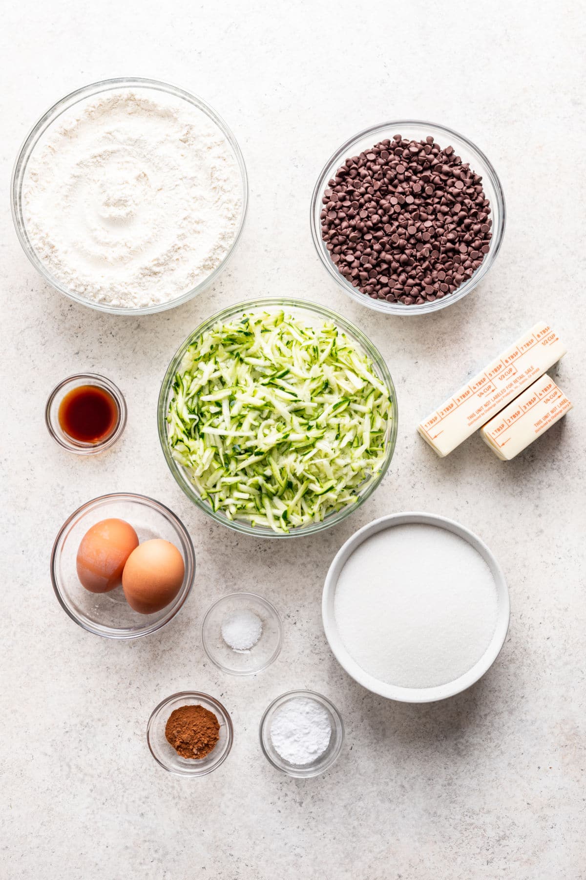 Ingredients for chocolate chip zucchini bread in dishes. 