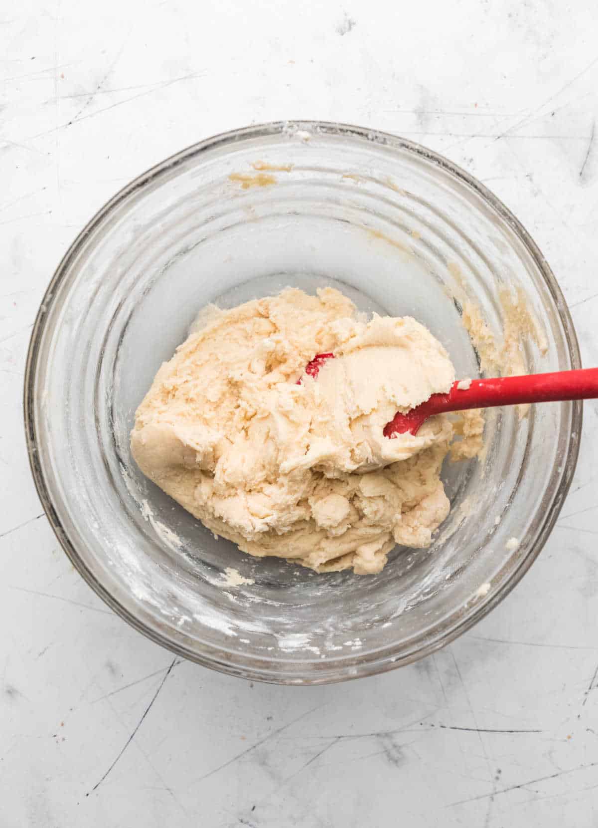 Lofthouse copycat cookie dough in a glass mixing bowl. 