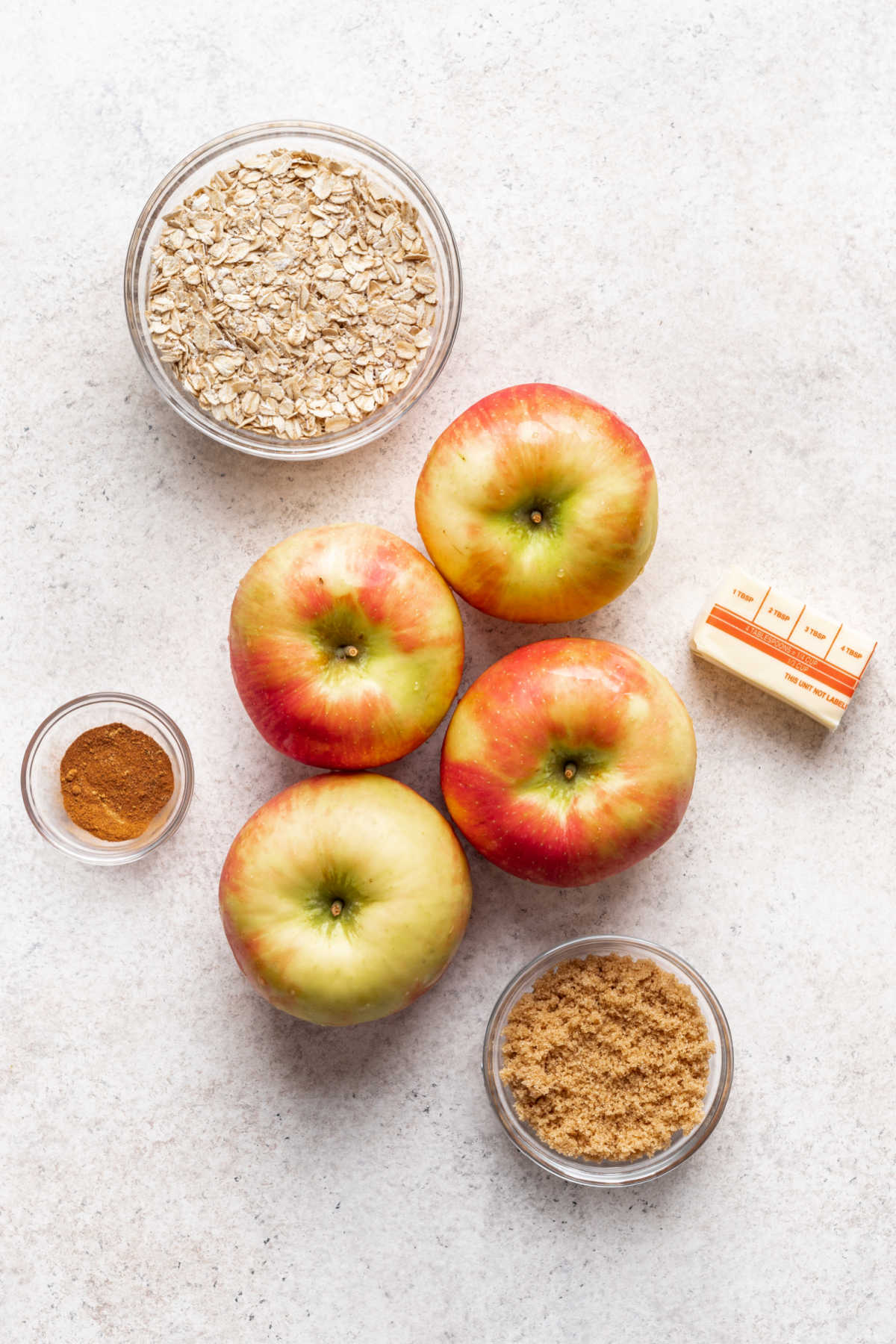 Ingredients for baked apples with oatmeal in dishes. 