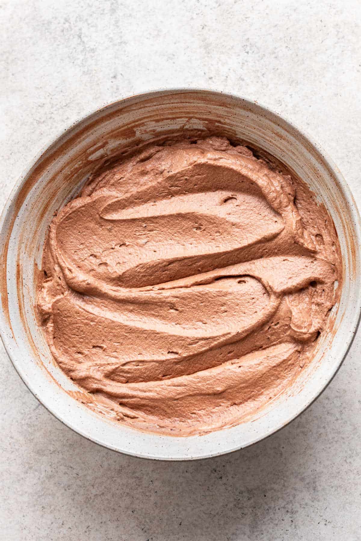 Chocolate mousse topping in a mixing bowl. 