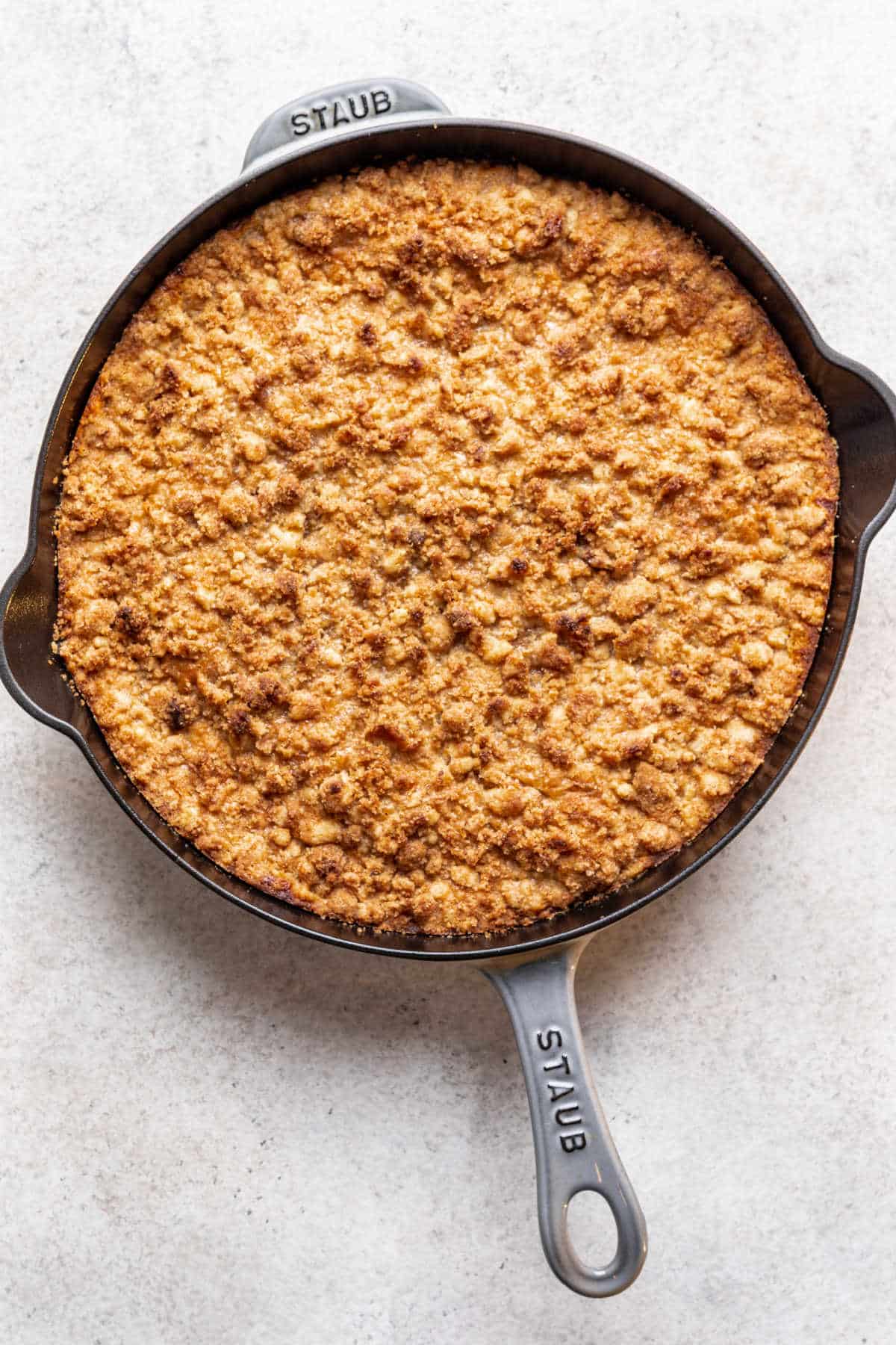 Baked pumpkin crisp in a cast iron skillet. 