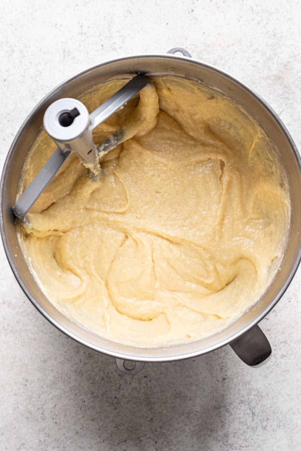 7 up pound cake batter in a silver mixing bowl. 