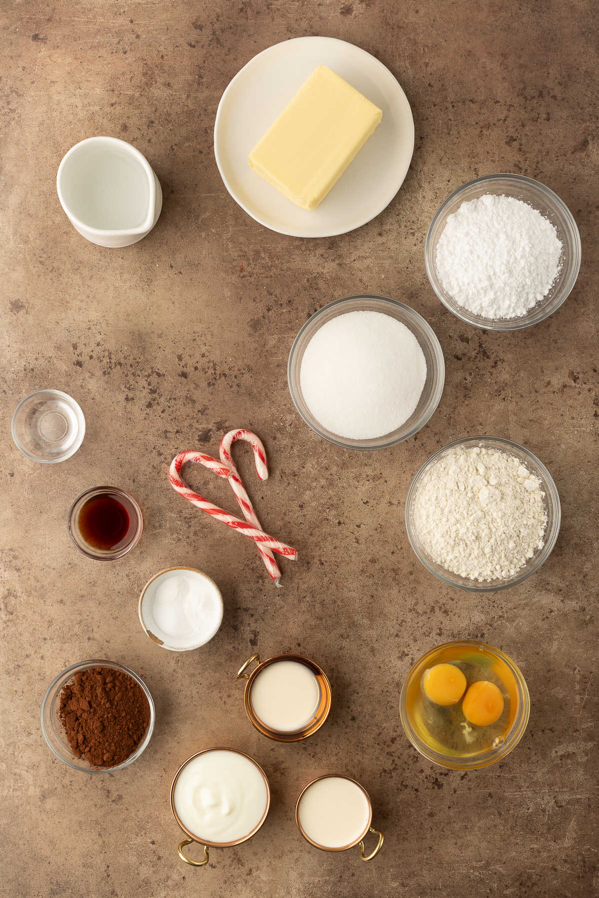 Ingredients for chocolate peppermint cupcakes in dishes. 