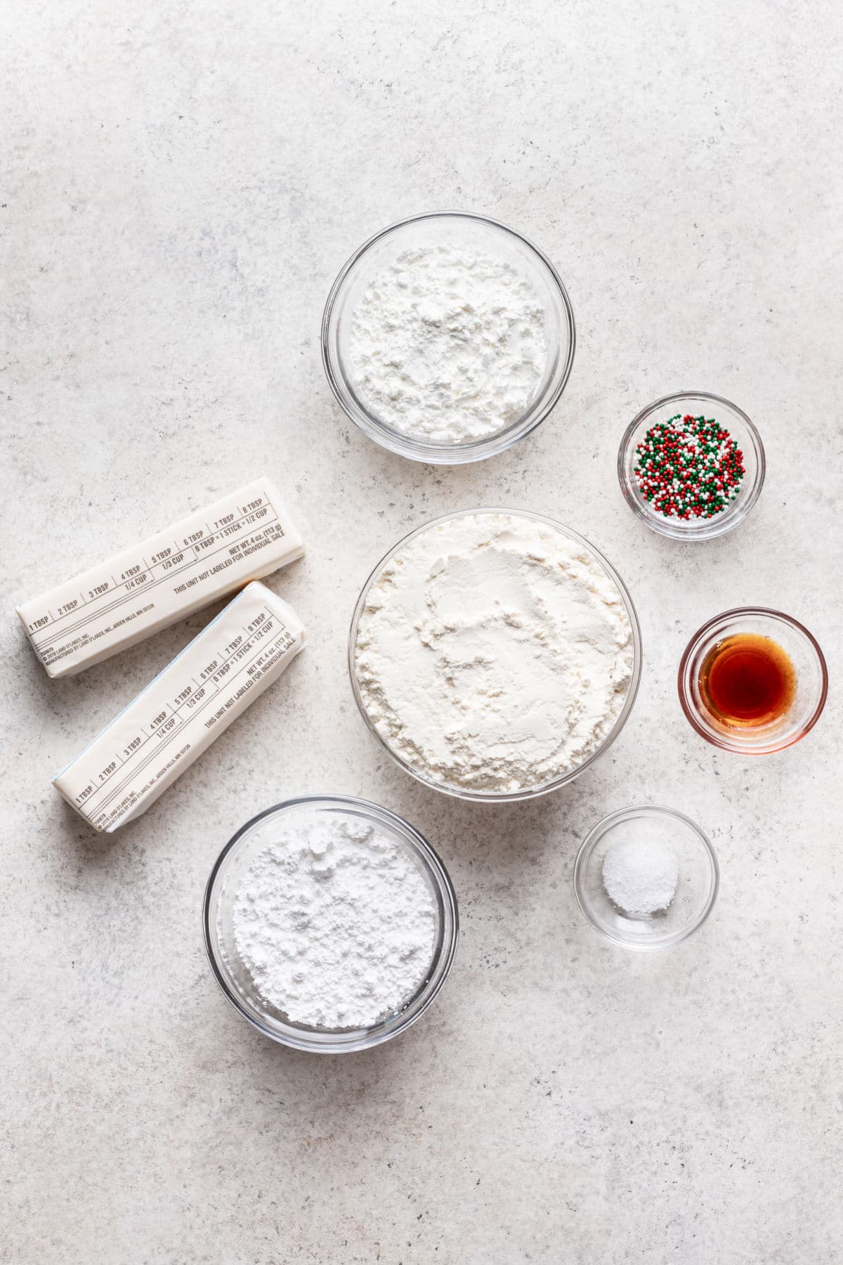 Ingredients for whipped shortbread cookies in dishes. 