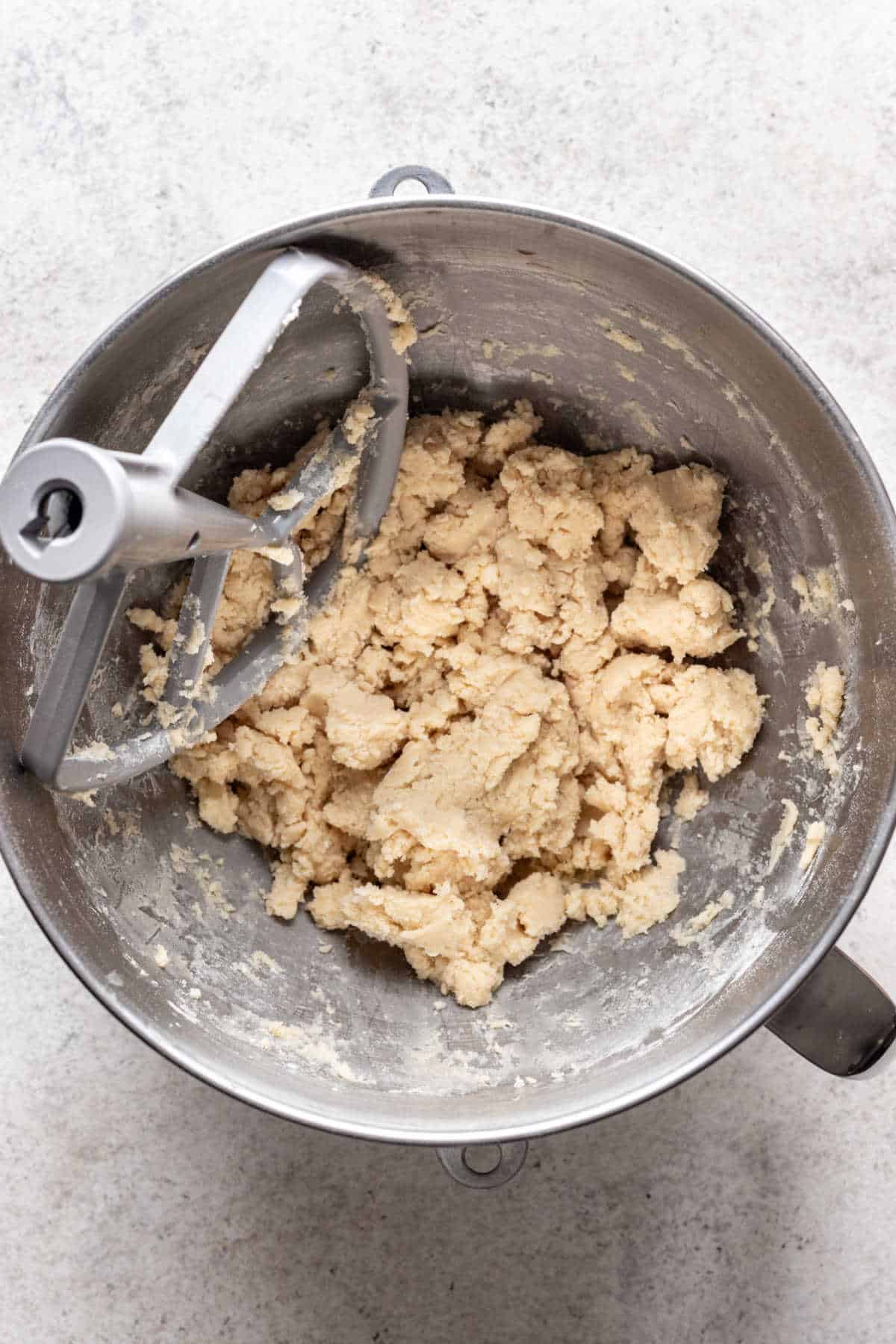 Flour and salt mixed into creamed butter mixture. 